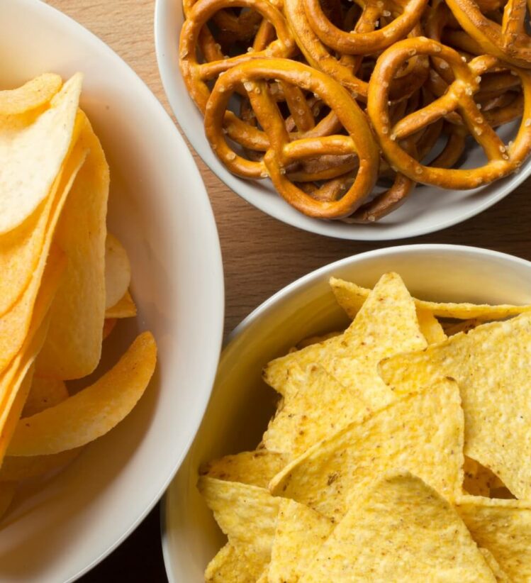selection of savoury snacks in bowls