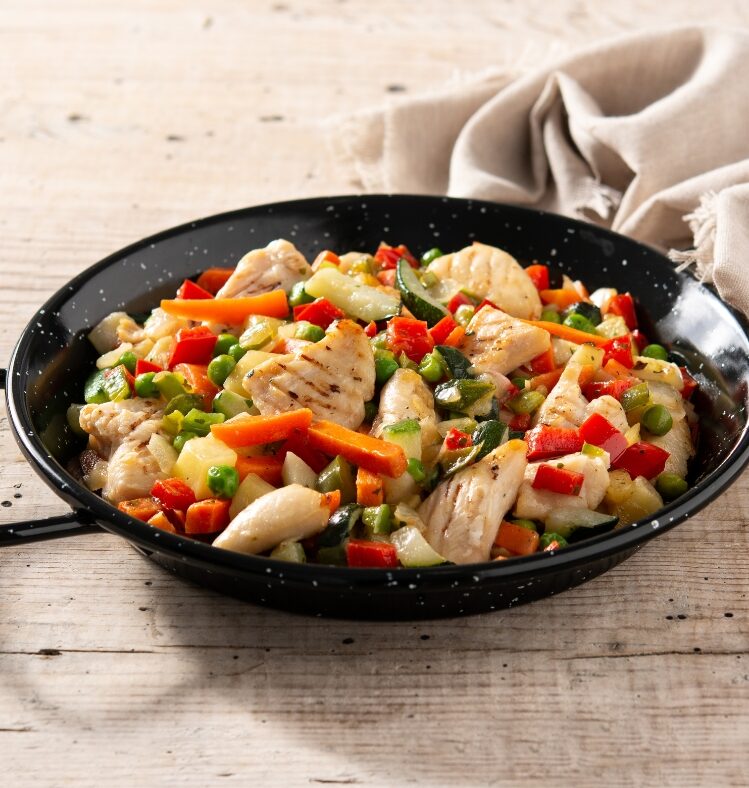 Bowl filled with chicken and vegetable stir fry