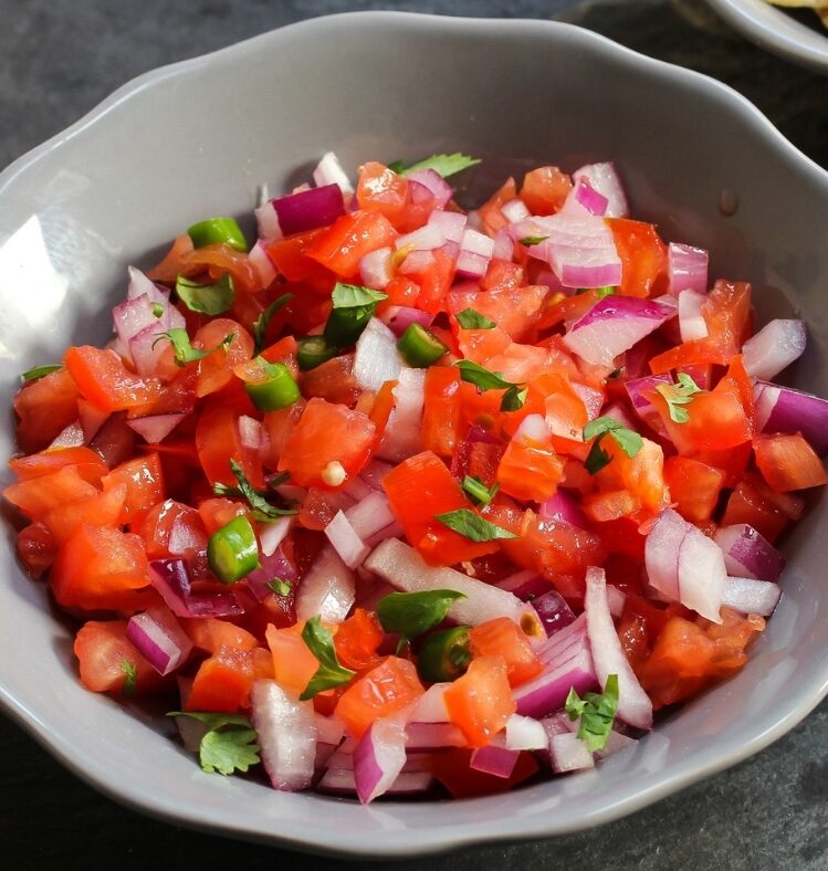 tomato salsa with chilli in bowl